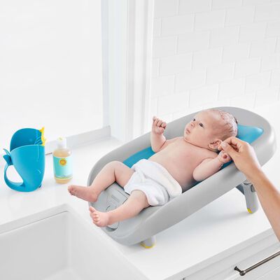 Skip Hop Asiento reclinado de bebé para baño Moby azul