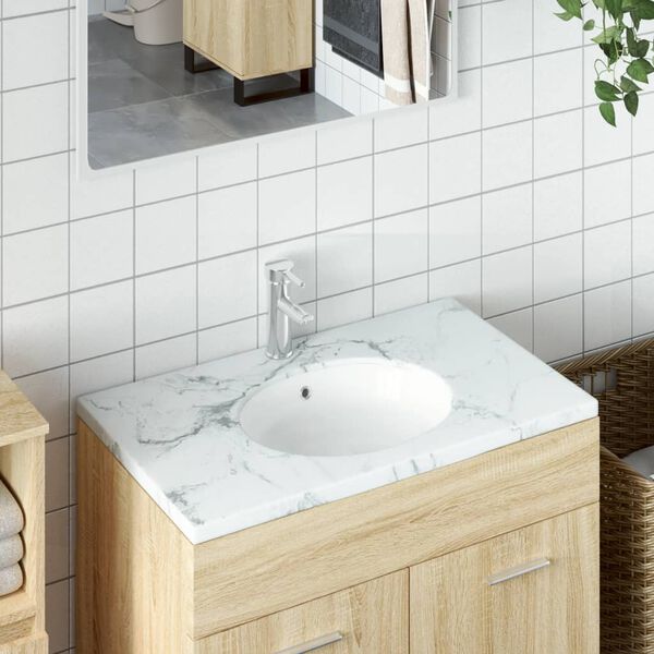 vidaXL Lavabo de ba&ntilde;o ovalado cer&aacute;mica blanco 38,5x33,5x19 cm