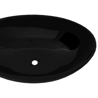 vidaXL Lavabo ovalado de cerámica negro 40x33 cm
