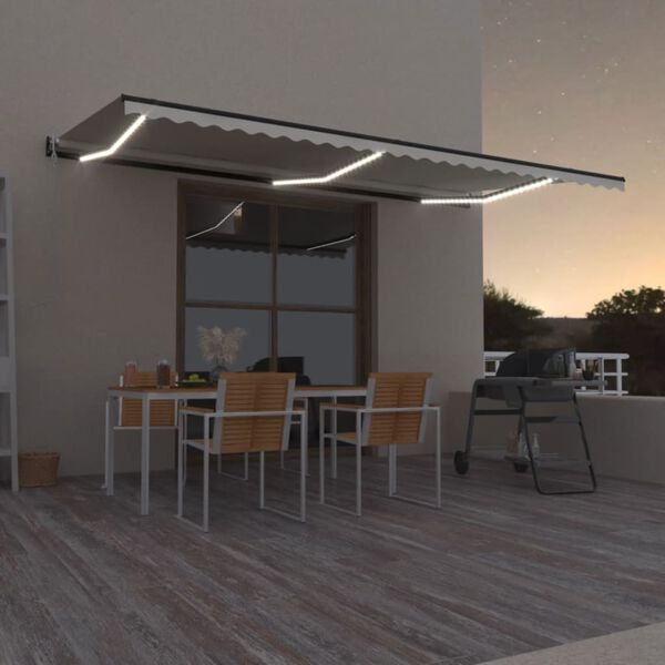 vidaXL Toldo autom&aacute;tico con LED sensor de viento crema 600x350 cm