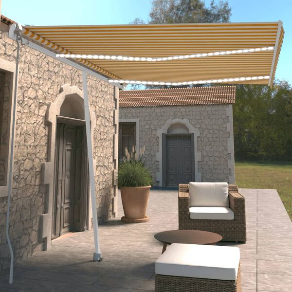 vidaXL Toldo retr&aacute;ctil manual con LED amarillo y blanco 350x250 cm