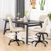 vidaXL Sillas de comedor giratorias 4 unidades tela crema