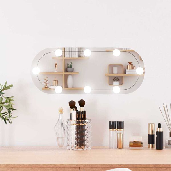 vidaXL Espejo de pared ovalado con luces LED vidrio 20x50 cm