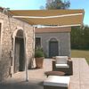 vidaXL Toldo autom&aacute;tico LED sensor de viento amarillo blanco 300x250cm