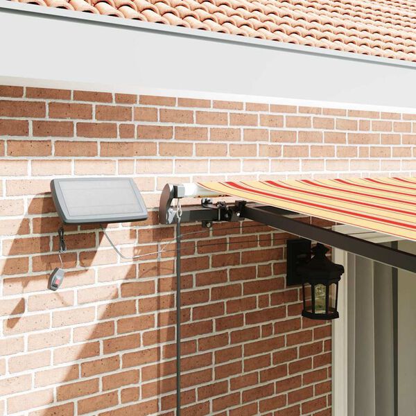 vidaXL Toldo Retráctil Manual amarillo y naranja 450 x 300 cm tela