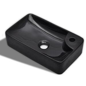 Lavabo de cer&aacute;mica con agujero para grifo negro