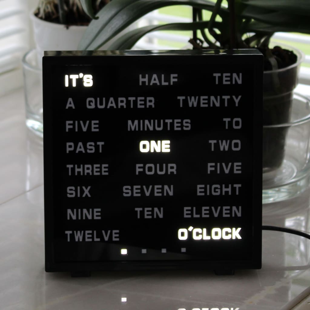 United Entertainment Reloj de palabras en inglés LED 16,5x17 cm