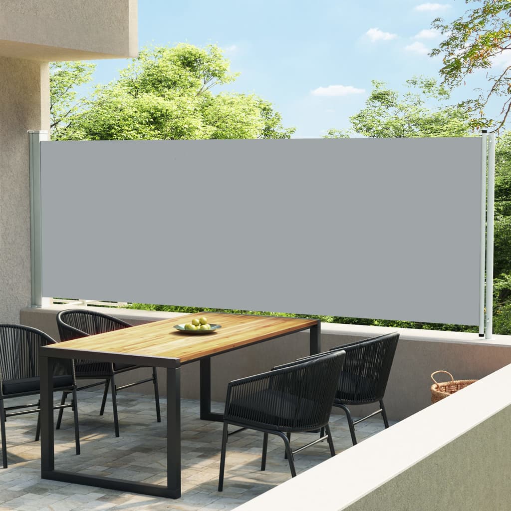 vidaXL Toldo lateral retráctil para patio gris 600x160 cm